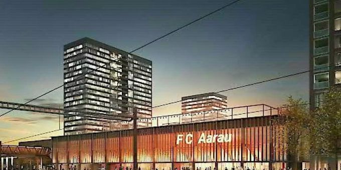 So wird es aussehen: Das neue Fussballstadion in Aarau mit vier Hochhäusern. Das Aarauer Stimmvolk macht jetzt den Weg frei. So wird es aussehen: Das neue Fussballstadion in Aarau mit vier Hochhäusern. Das Aarauer Stimmvolk macht jetzt den Weg frei.
