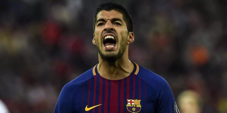 Luis Suarez wird am rechten Knie operiert und fällt vorerst aus. Foto: Angelos Tzortzinis/dpa