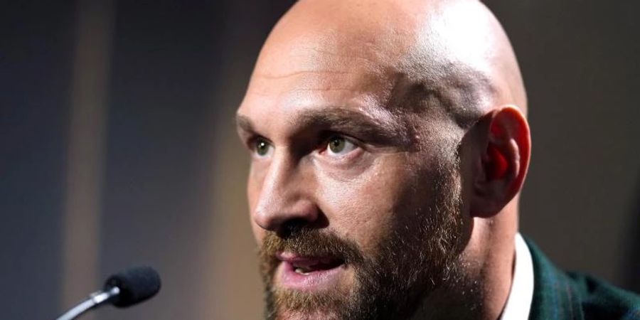 Die Maxime des britischen Box-Weltmeisters Tyson Fury: «Liebe deine Frau und kämpfe für dein Land». Foto: John Walton/PA Wire/dpa