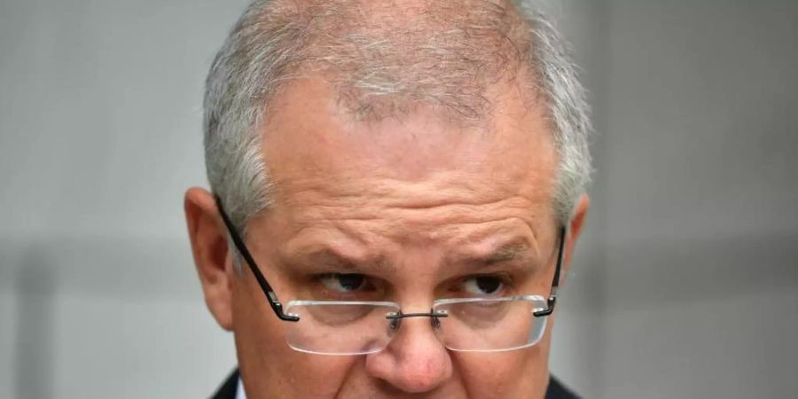 Australiens Premierminister Scott Morrison bei einer Pressekonferenz. Foto: Mick Tsikas/AAP/dpa