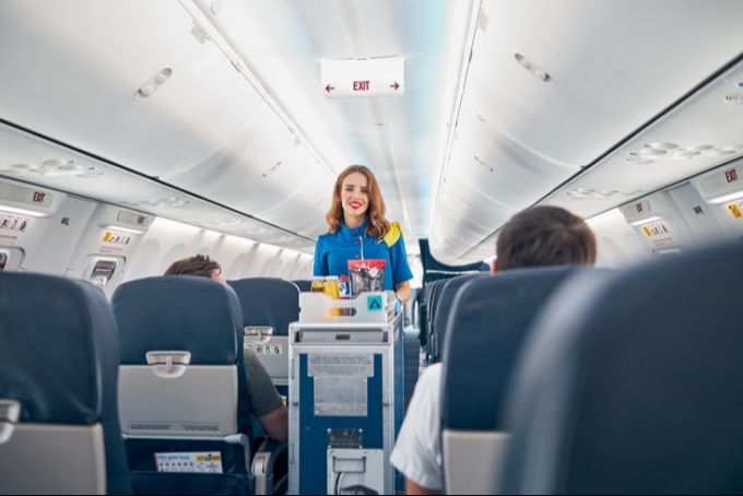 Ein Lächeln in 10'000 Metern Höhe – guter Service wirkt manchmal wahre Wunder. Flugbegleiterin