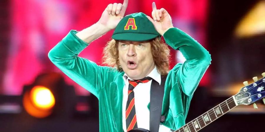 AC/DC-Leadgitarrist Angus Young. Foto: Jan Woitas/dpa-Zentralbild/dpa/Archiv