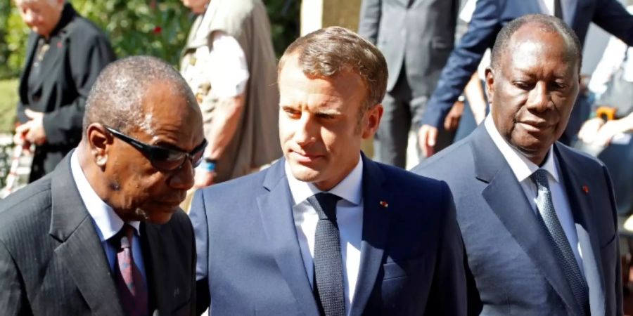 Die Präsidenten Condé, Macron und Ouattara (v.l.n.r.)