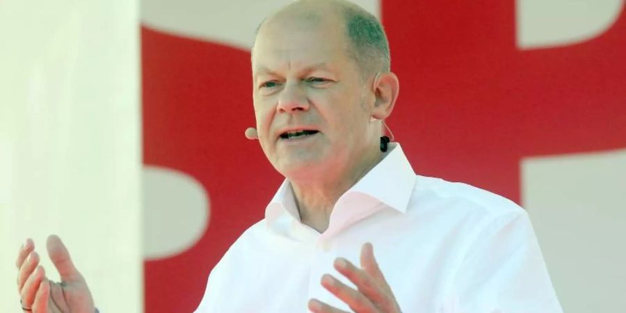 Bundesfinanzminister Olaf Scholz, Kanzlerkandidat der SPD, spricht bei einer Wahlkampfkundgebung im Bezirk Mitte. Foto: Britta Pedersen/dpa-Zentralbild/dpa