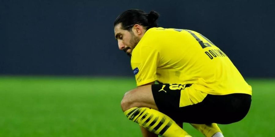 Dortmunds Emre Can hat sich am Oberschenkel verletzt. Foto: Martin Meissner/AP-Pool/dpa