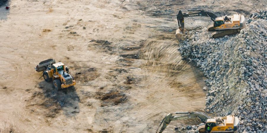Bagger Steinbruch Arbeitsgerät Rohstoffabbau