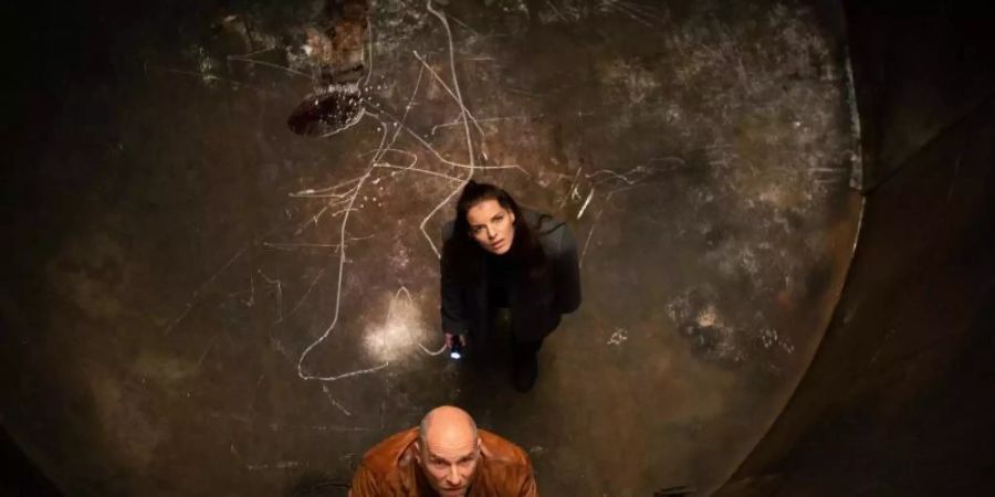 Das sieht nicht gut aus: Viola Delbrück (Yvonne Catterfeld) und Butsch (Götz Schubert) wurden eingesperrt. Foto: Felix Matthies/Molina Film/MDR/ARD/dpa