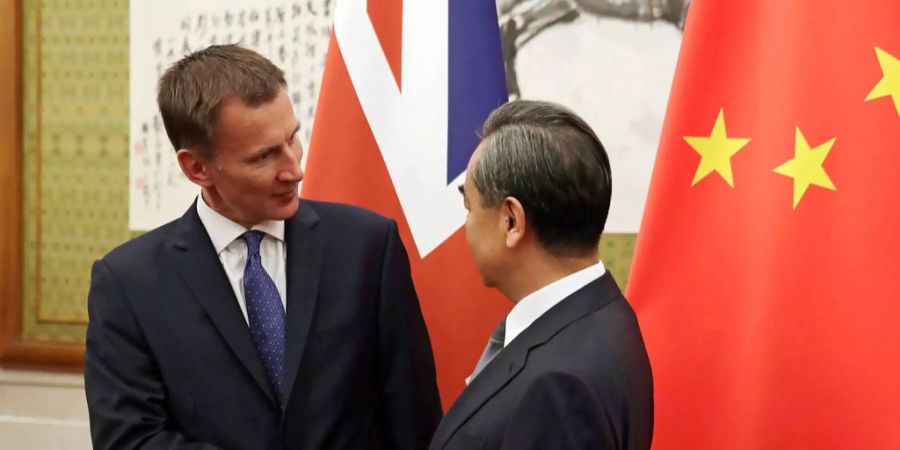 Der britische Aussenminister Jeremy Hunt und sein chinesischer Kollege Wang Yi.
