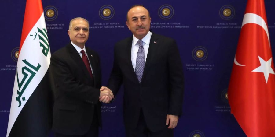 Mohamed Ali Alhakim und Mevlut Cavusoglu.