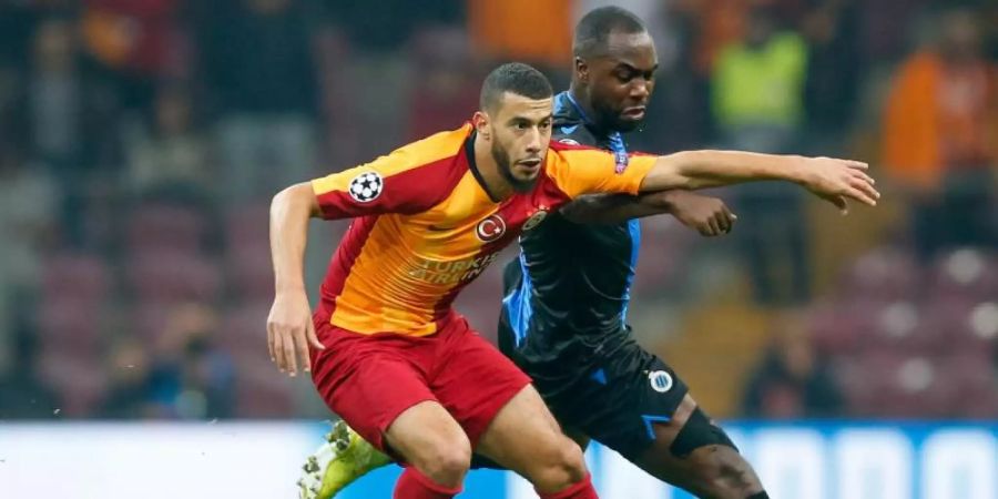 Muss Galatasaray Istanbul verlassen: Younes Belhanda (l). Foto: Bruno Fahy/BELGA/dpa