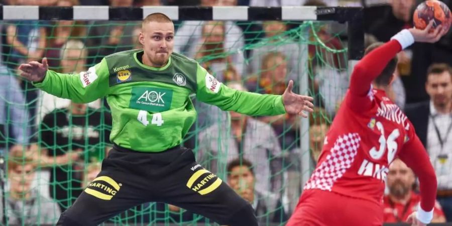 Machte im DHB-Tor ein überragendes Spiel: Keeper Dario Quenstedt. Foto: Sina Schuldt/dpa