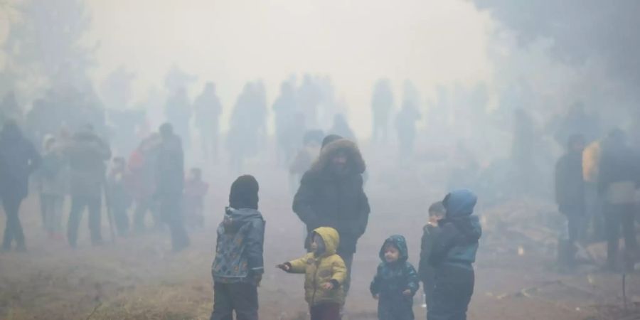 Migranten an der belarussisch-polnischen Grenze