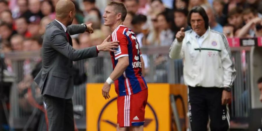 Konnten nicht gut miteinanender beim FC Bayern: Ex-Trainer Pep Guardiola (l) und Ex-Teamarzt Hans-Wilhelm Müller-Wohlfahrt. Foto: picture alliance / dpa