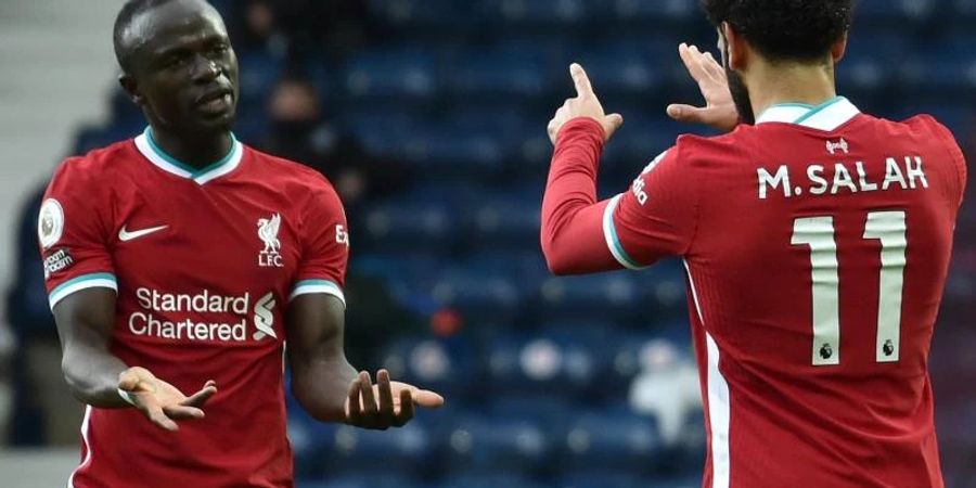 Treffen in der WM-Quali aufeinander: Die Liverpool-Stars Mo Salah (r) und Sadio Mané. Foto: Rui Vieira/PA Wire/dpa