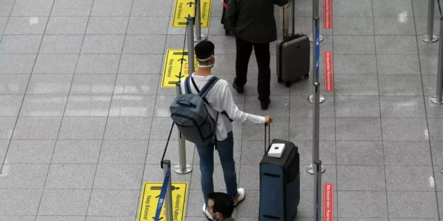 Rückkehrer am Flughafen Düsseldorf