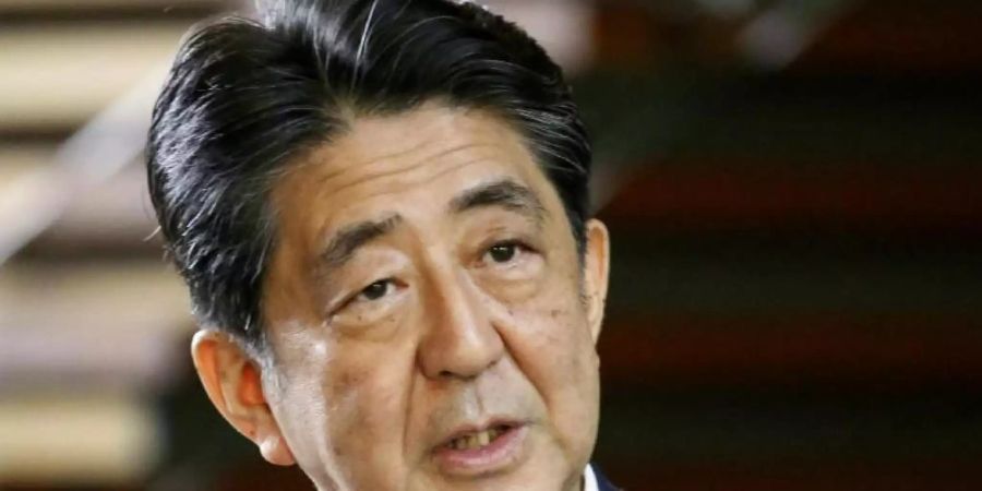 Japans Premierminister Shinzo Abe tritt aus gesundheitlichen Gründen zurück. Foto: Uncredited/Kyodo News/AP/dpa