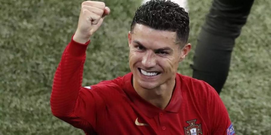 Portugals Cristiano Ronaldo jubelt nach dem Spiel gegen Frankreich. Foto: Laszlo Balogh/POOL AP/dpa