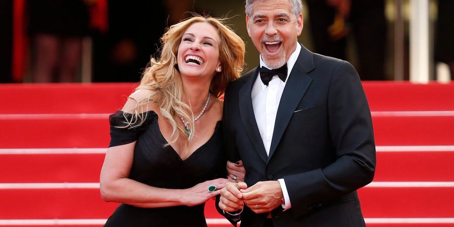 Die US-Schauspieler Julia Roberts und George Clooney bei den Filmfestspielen in Cannes (2016).