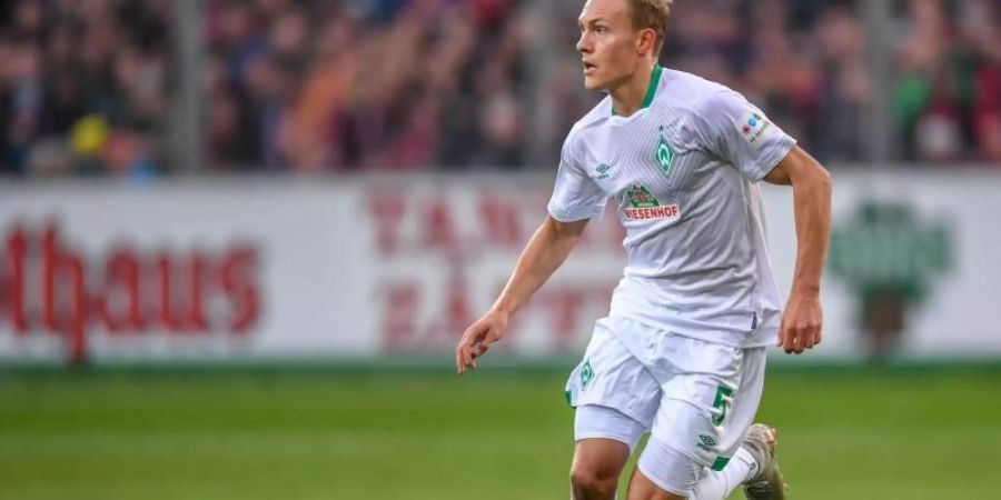 Fällt länger als erwartet für Werder Bremen aus: Ludwig Augustinsson. Foto: Patrick Seeger/dpa