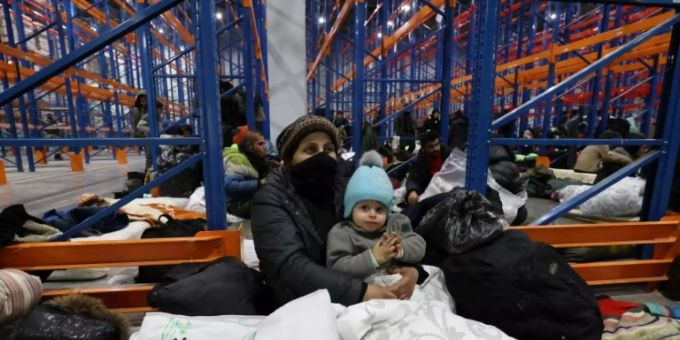 Migranten in einem Logistikzentrum in Belarus Migranten in einem Logistikzentrum in Belarus