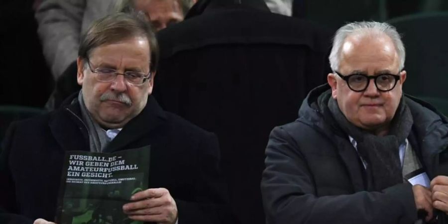Kritisieren die neuen Corona-Beschlüsse von Bundesregierung und Länderchefs: DFB-Vize Rainer Koch (l) und DFB-Präsident Fritz Keller. Foto: Federico Gambarini/dpa
