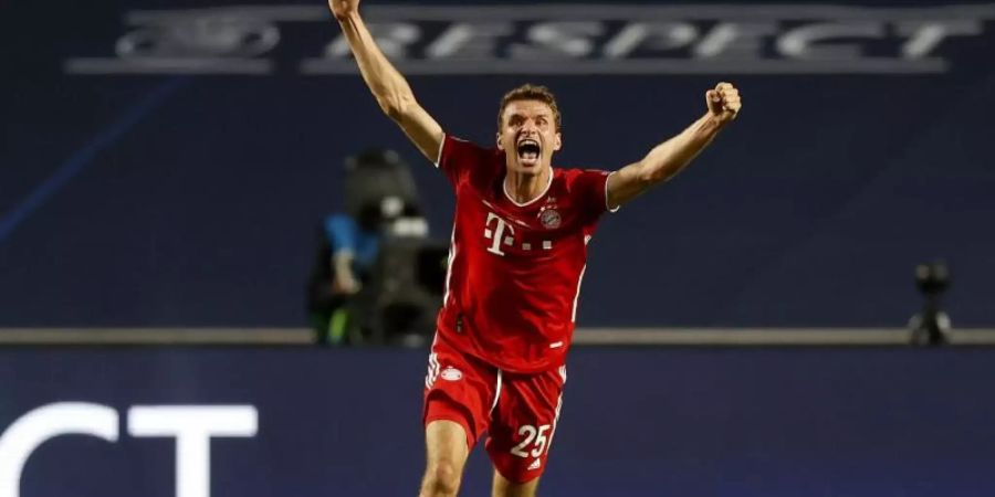 Thomas Müller gewann mit dem FC Bayern zum zweiten Mal die Champions League. Foto: Matthew Childs/Pool Reuters/AP/dpa