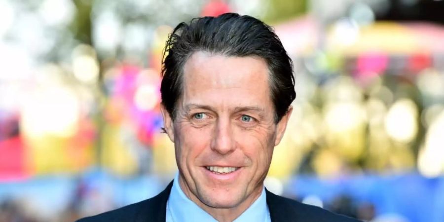 Der britische Schauspieler Hugh Grant wird 60. Foto: Matt Crossick/Press Association/dpa