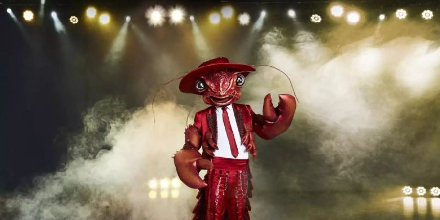 Die Figur «Der Hummer» aus der Prosieben-Show «The Masked Singer». Foto: Marc Rehbeck/ProSieben/dpa