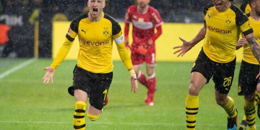 Marco Reus (l) will mit dem BVB die Meisterschaft gewinnen. Foto: Bernd Thissen
