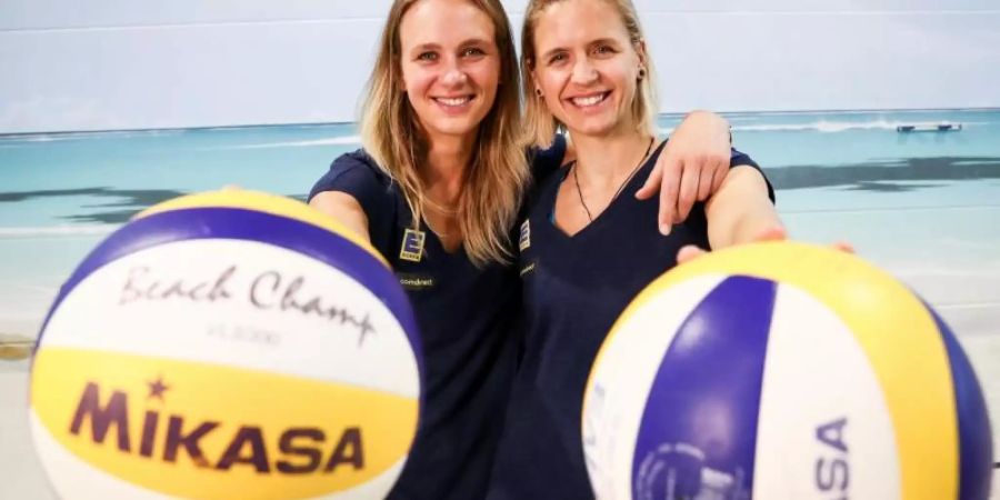 Margareta Kozuch (l) und Laura Ludwig sind bei der WM in Hamburg am Start. Foto: Christian Charisius