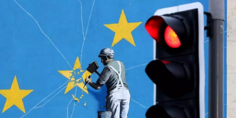 Das Brexit-Wandbild des Streetart-Künstlers Banksy. Schon Ende Oktober will Boris Johnson sein Land aus der EU führen. Foto: Gareth Fuller/PA Wire