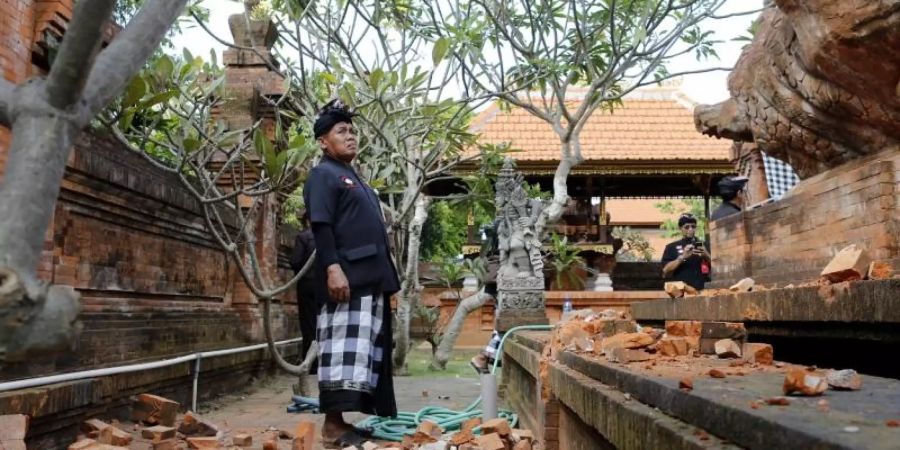 Erdbebenschäden in einem Tempel auf Bali. Foto: Firdia Lisnawati/AP