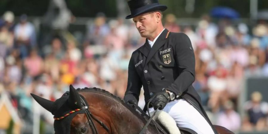 Michael Jung auf Chipmunk bei der Dressurprüfung. Foto: Friso Gentsch