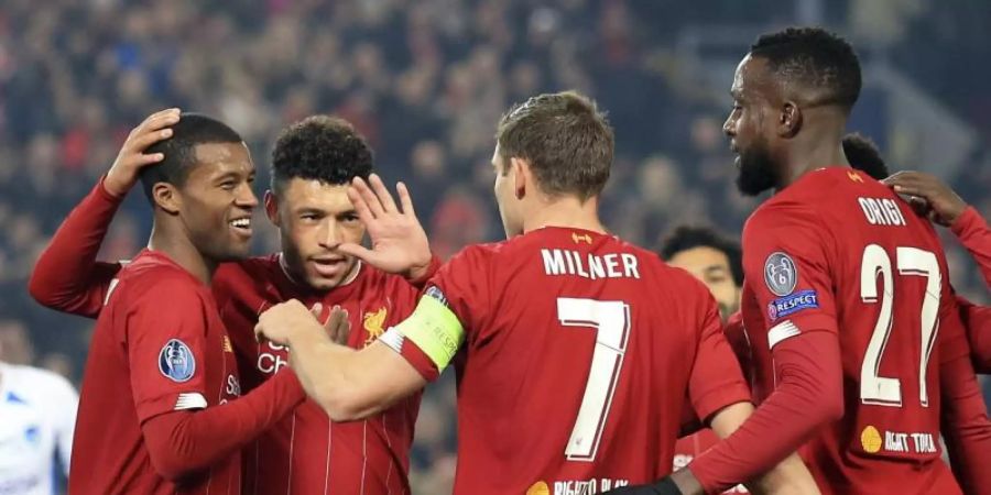 Die Spieler vom FC Liverpool feiern das 1:0 gegen Genk. Foto: Jon Super/AP/dpa