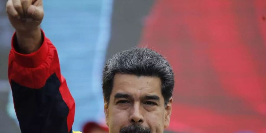 Mitten im Machtkampf zwischen Regierung und Opposition in Venezuela will sich Präsident Nicolás Maduro Unterstützung von Kremlchef Wladimir Putin holen. Foto: Ariana Cubillos/AP