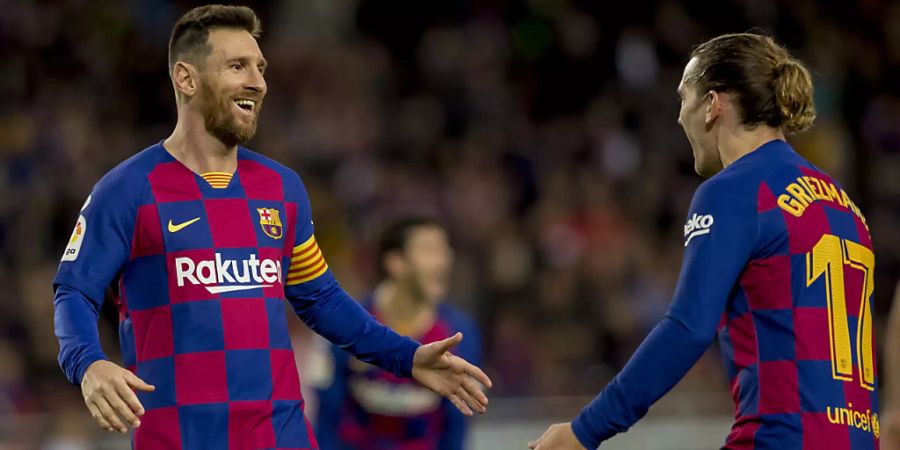 Zwei Torschützen freuen sich: Lionel Messi (links) und Antoine Griezmann