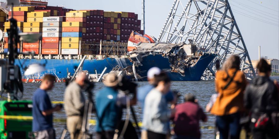 Engineers detonate controlled explosives to remove Key Bridge from the Dali