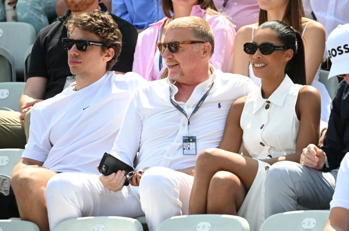 Der ehemalige Tennisprofi Boris Becker sitzt mit seinem Sohn Elias (l) und seiner Partnerin Lilian (r) bei der ATP-Tour in Stuttgart. (Archivbild) Boris Becker und Lilian de Carvalho Monteiro und Sohn Elias.