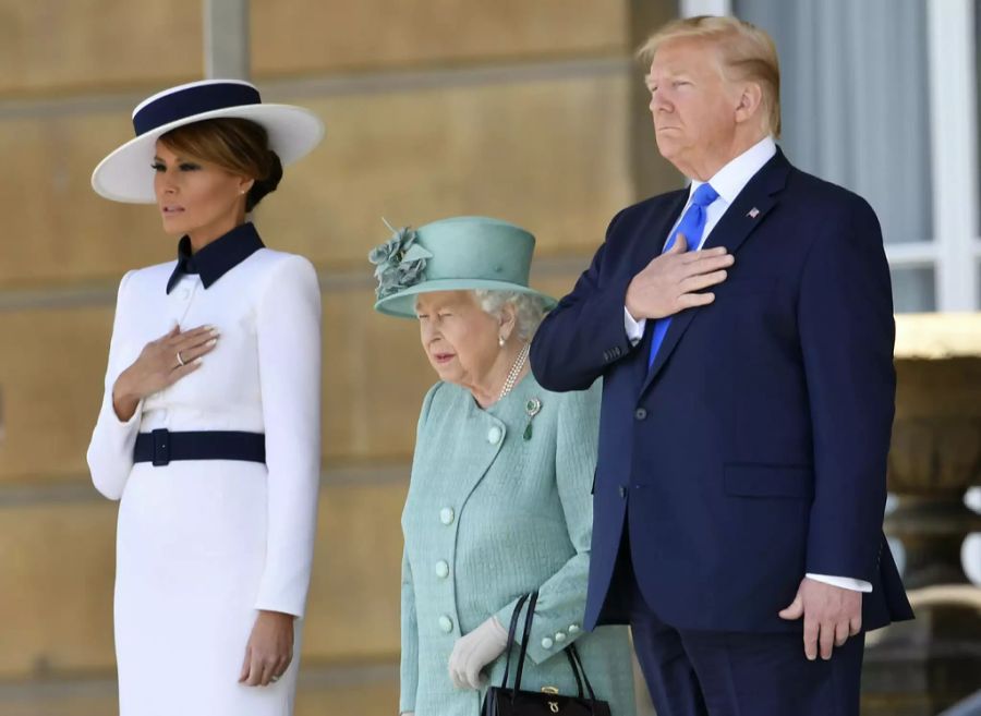 Melania, die Queen und Donald Trump im Juni 2019.