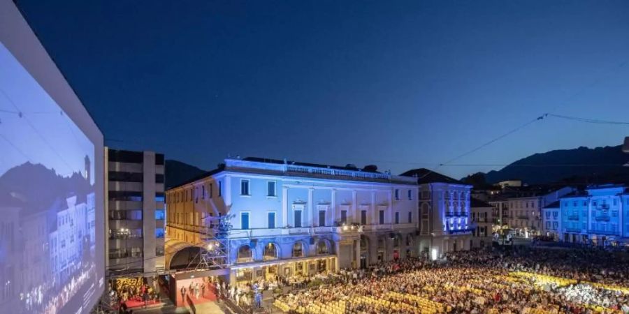 Zuschauer auf dem Piazza Grande 2019 beim Internationalen Filmfestival Locarno. Foto: Urs Flueeler/KEYSTONE/dpa