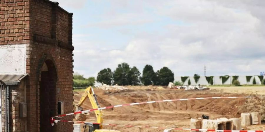 In Erftstadt tat sich in der Nacht zum 15. Juli die Erde auf und verschlang mehrere Häuser. Foto: Oliver Berg/dpa