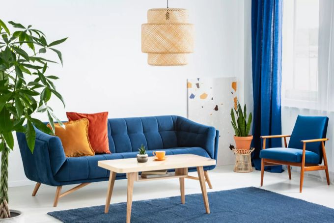 Das reduzierte Design und die geradlinigen Formen machen den Mid Century Stil aus. Möbel Holz Optik