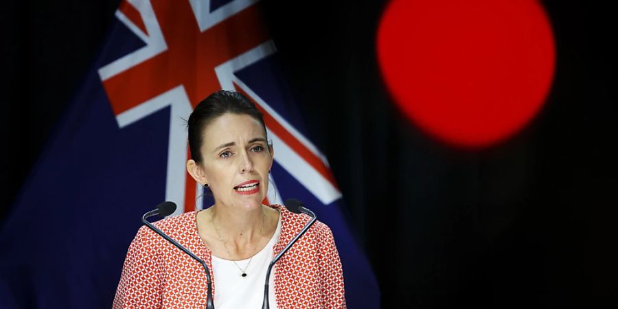 New Zealand Prime Minister Jacinda Ardern speaks to the media during a press conference at Parliament in Wellington, New Zealand, Sunday, January 23, 2022. The prime minister announced that New Zealand will be moving to the red traffic light setting at 11.59pm tonight after nine cases reported in Nelson/Marlborough region were discovered to have the Omicron variant. (AAP Image/Pool, Hagen Hopkins) NO ARCHIVING