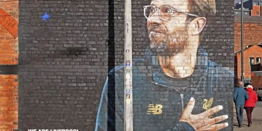 Kultstatus: Das Porträt von Liverpools Trainer Jürgen Klopp prangt an der Ecke Jordan Street und Jamaica Street auf einer Hauswand. Foto: Lars Reinefeld