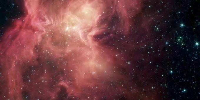 Eine Infrarotfotografie des «Spitzer»-Weltraumteleskops zeigt einen rotgefärbten Gasnebel in Schmetterlingsform. Universum Hubble