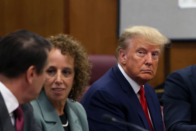 epa10558850 Former US President Donald J. Trump (R) appears in the New York Criminal Court in New York, New York, USA, 04 April 2023. A Manhattan grand jury voted to indict former President Donald J. Trump who turned himself in at the courthouse and appeared before a judge to hear the charges against him. EPA/ANDREW KELLY / POOL Indictment of Former US President Donald J. Trump
