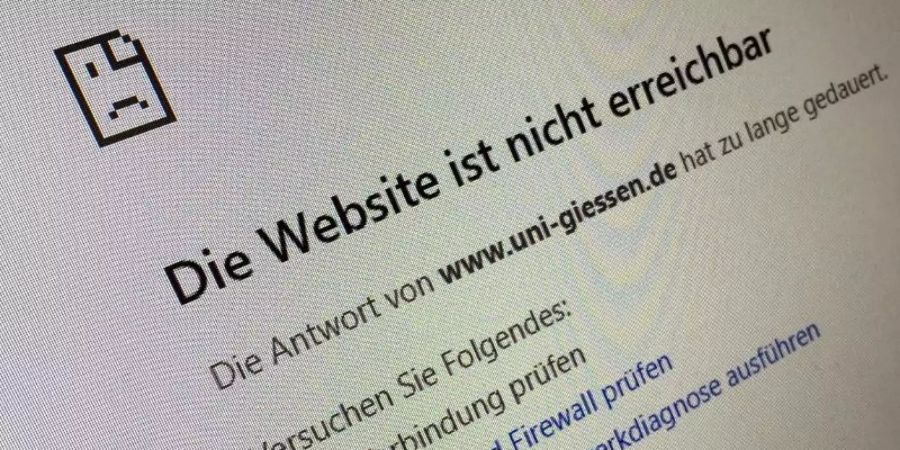 «Die Website ist nicht erreichbar» wird angezeigt, wenn man versucht, die Justus-Liebig-Universität in Giessen über das Internet zu erreichen. Foto: Roland Holschneider/dpa