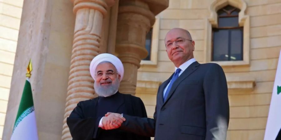 Saleh mit seinem iranischen Kollegen Ruhani im März