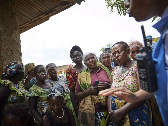 Einwohner an einer Ebola-Bekämpfungs-Kampagne im Kongo. kongo