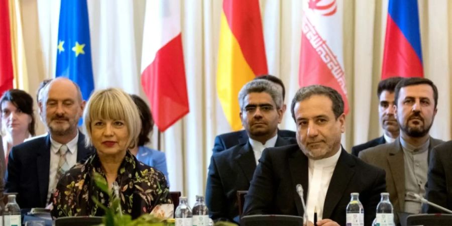 Irans Vize-Aussenminister Araktschi (r.) in Wien